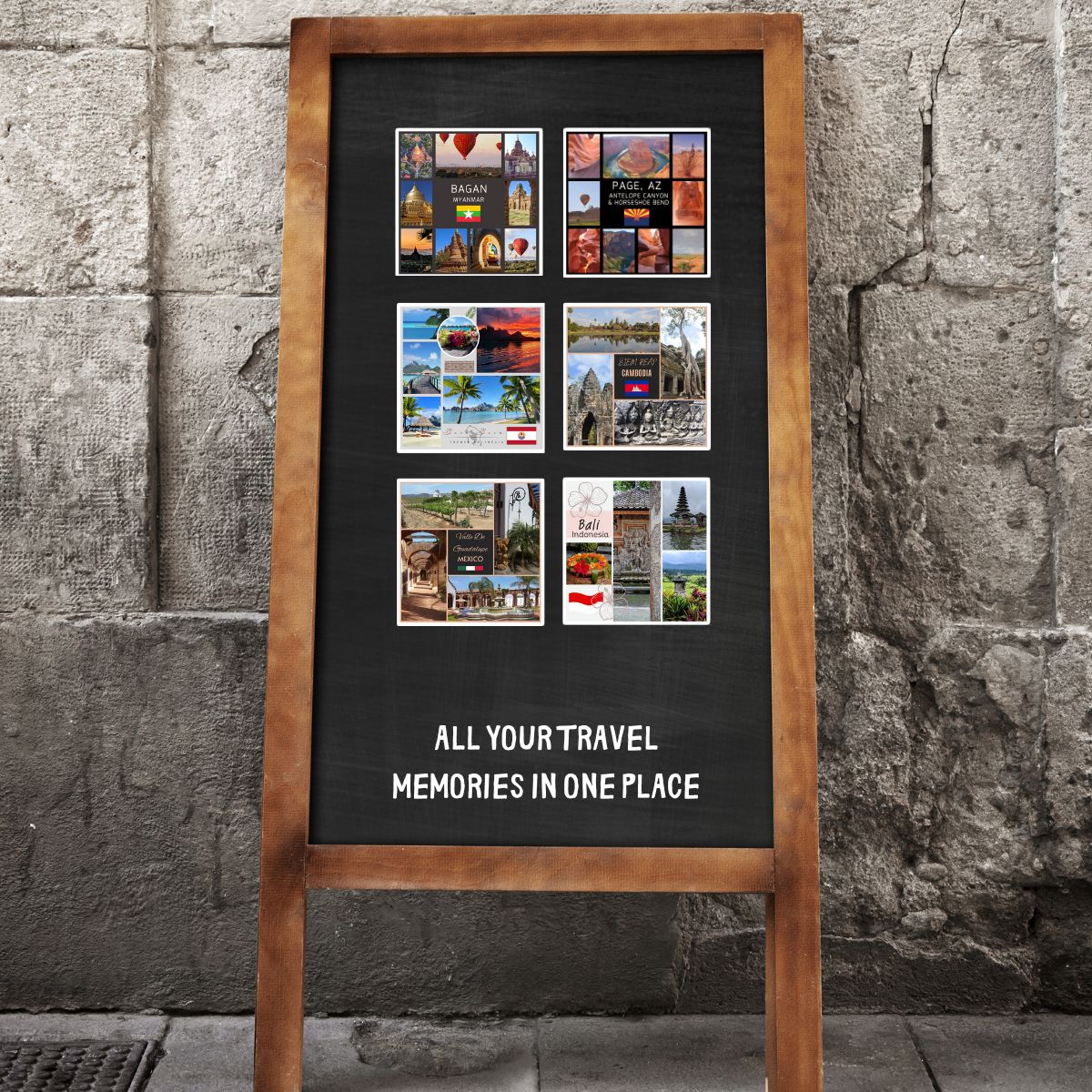 Wooden frame with black background displaying travel photos against a stone wall.