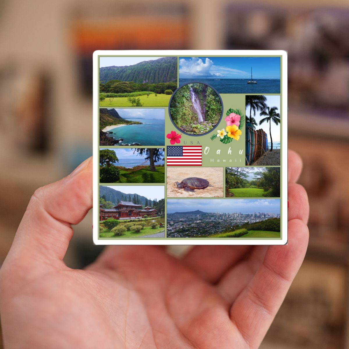 Hand holding a postcard with a collage of Hawaii images.