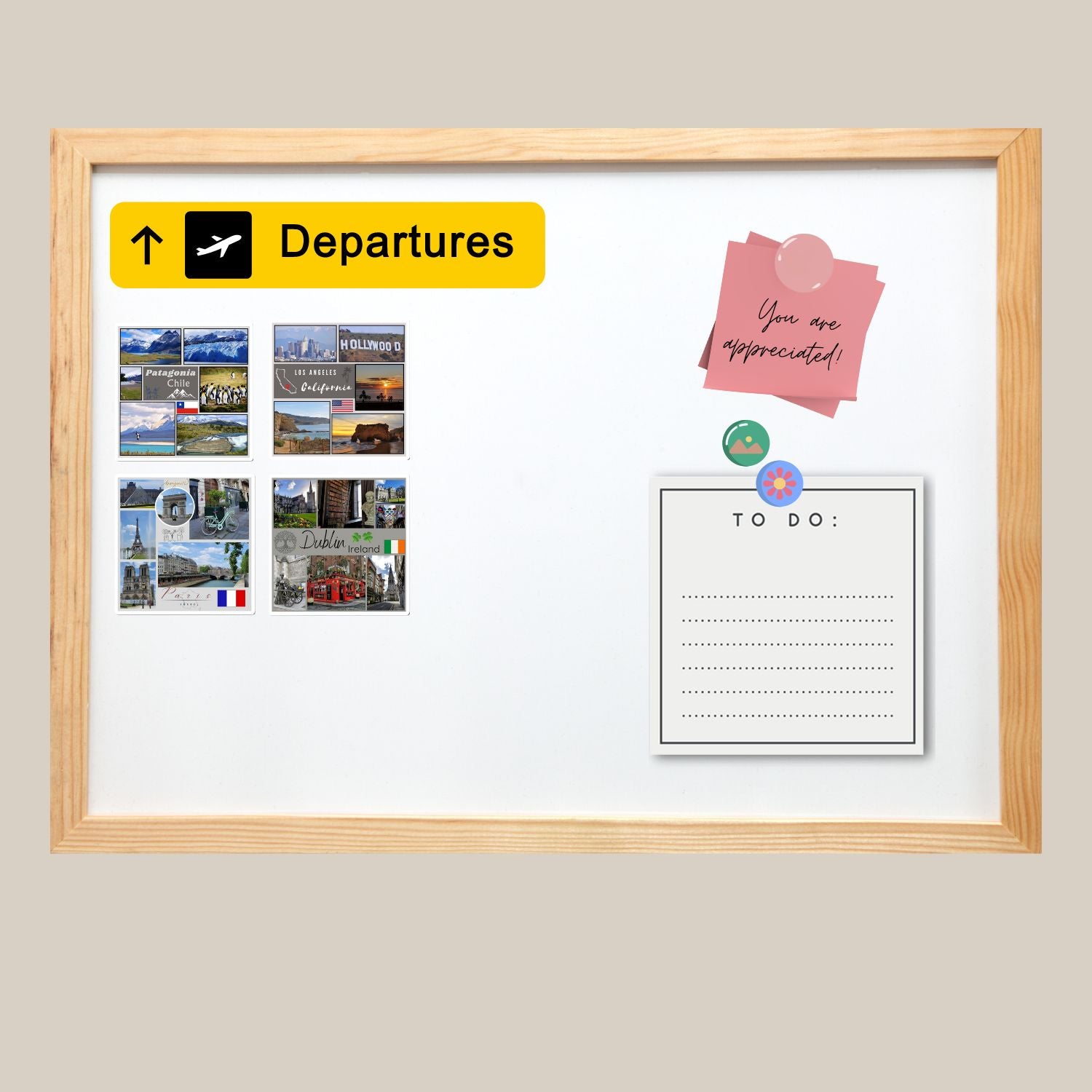 Whiteboard with wooden frame labeled 'Departures' on a beige wall.