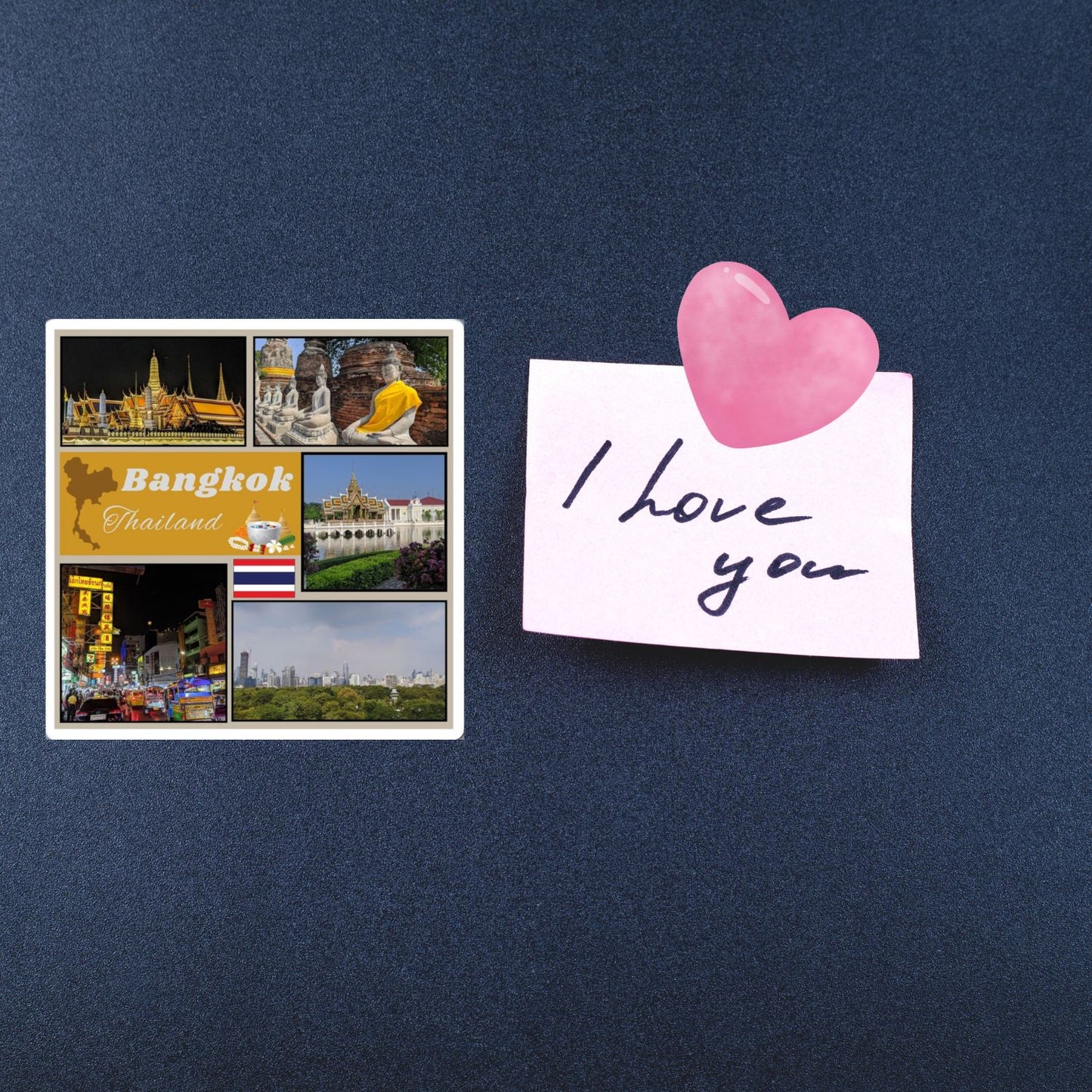 Note with 'I love you' text and pink heart on a dark blue background