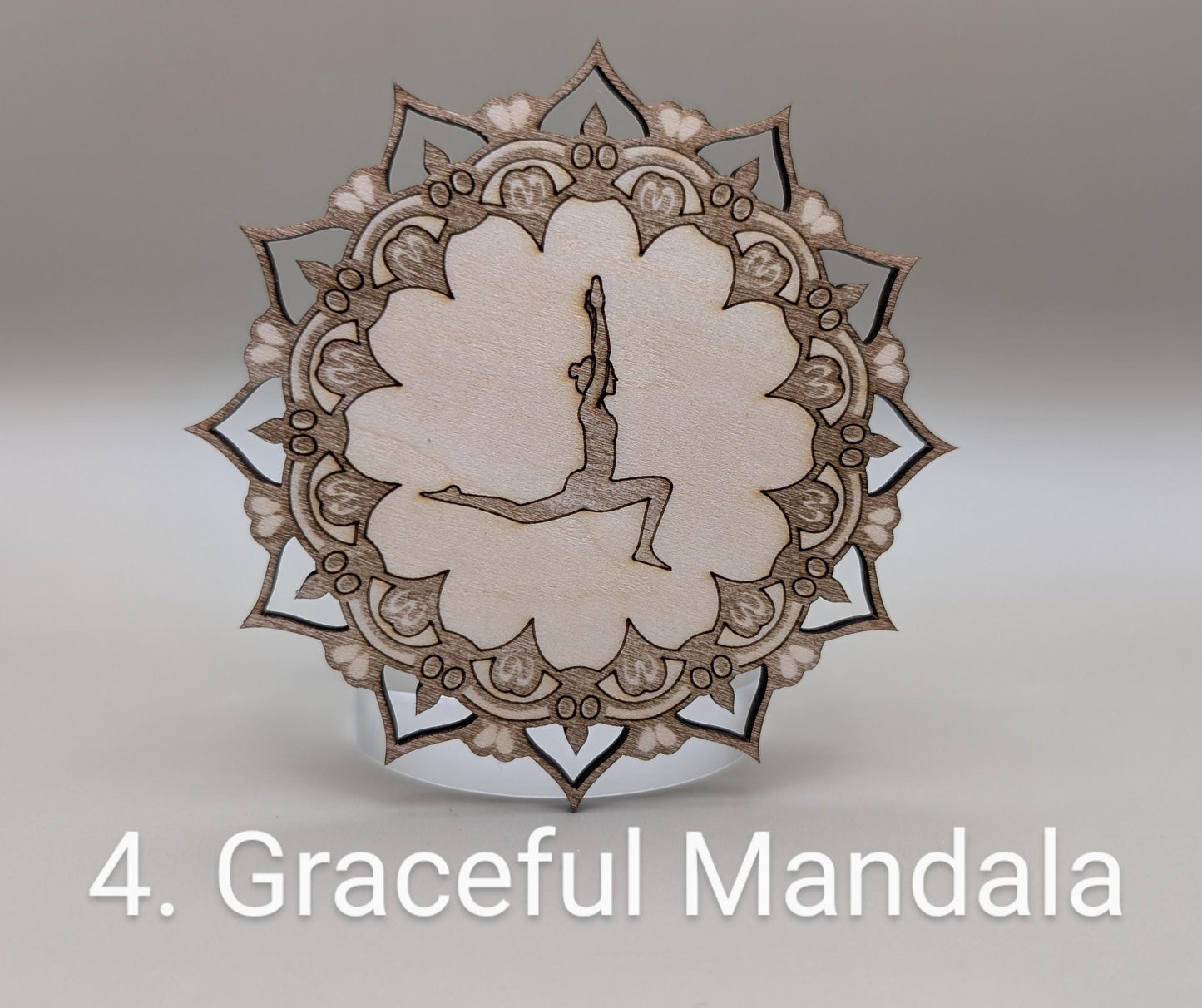 Decorative wooden mandala with intricate patterns on a gray background