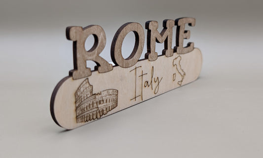 Wooden sign with 'Rome Italy' text and Colosseum illustration on a light gray background